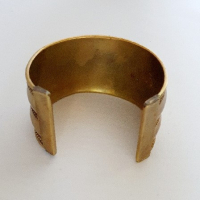 Goudkleurige slavenarmband